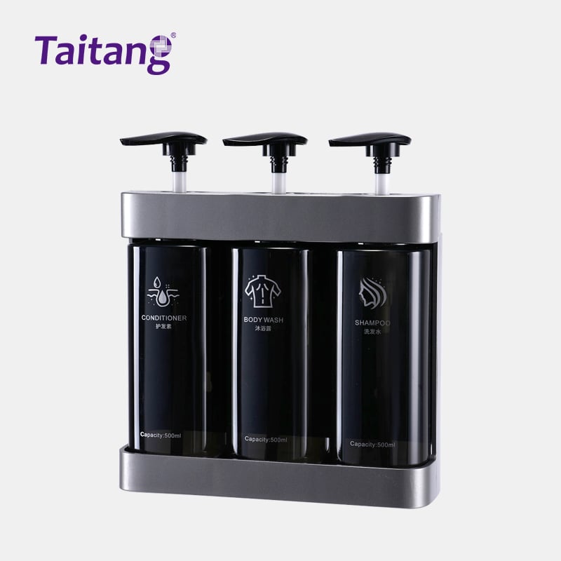 Taitang luxury triple shower dispenser system featuring sleek black bottles labeled Conditioner, Body Wash, and Shampoo.jpg