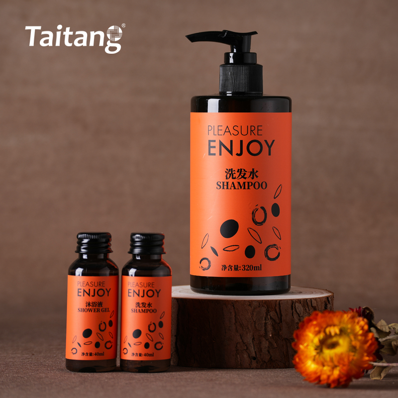 Large pump shampoo bottle and two small travel bottles from Taitang's orange PLEASURE ENJOY line..jpg