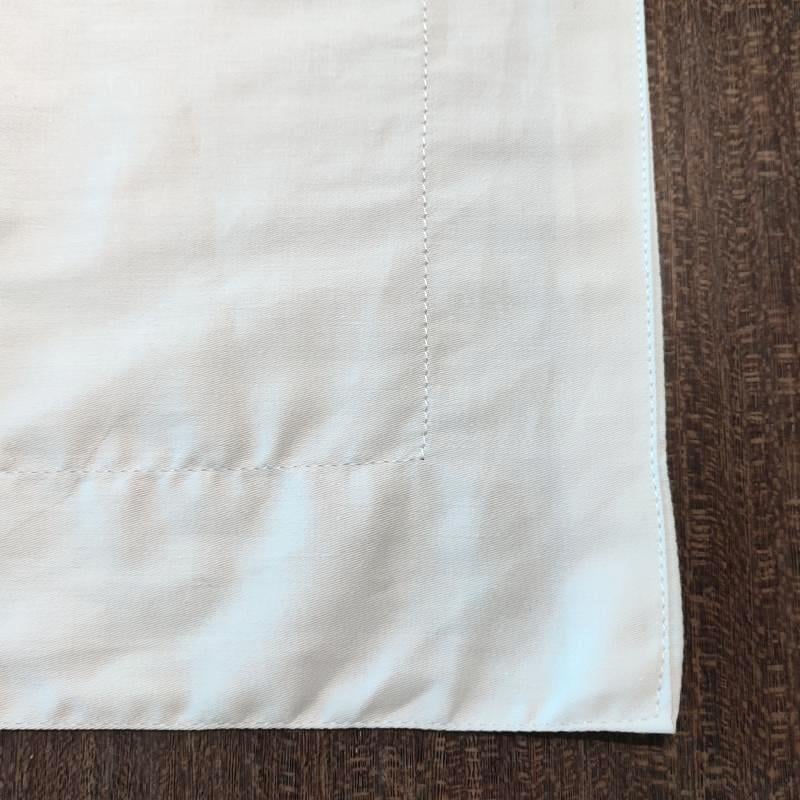 Luxury Oxford style hotel pillowcase with decorative flange border crafted from high-thread-count white cotton by Taitang.jpg