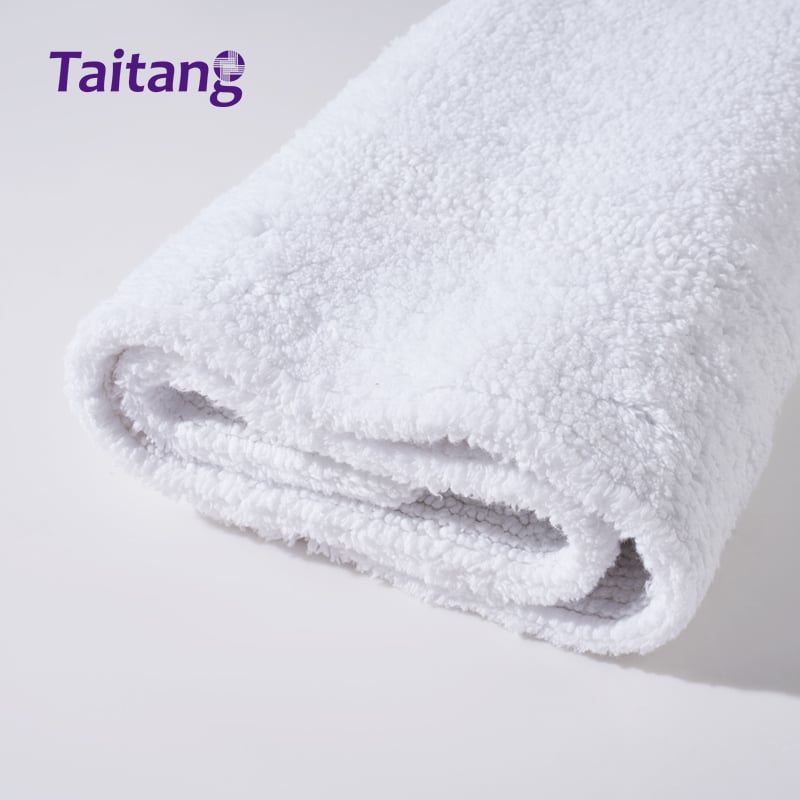 Oq mehmonxona bath mat va spa bath rug 1100 g og'irlikdagi mo'tabar paxta, elegan chegarali dizayn bilan