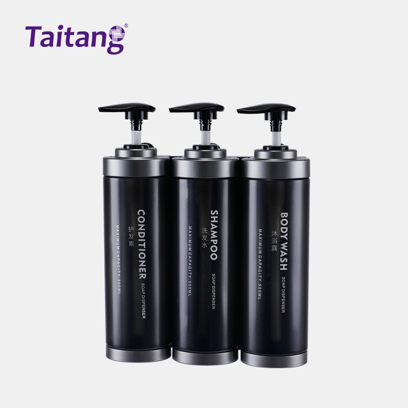 3. Premium triple-chamber matte black Taitang luxury shower dispensers with silver metal accent trim, labeled for Conditioner, Shampoo, and Body Wash.jpg