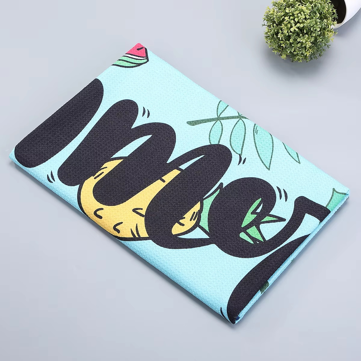 What are the benefits of antimicrobial treatment in beach towels?