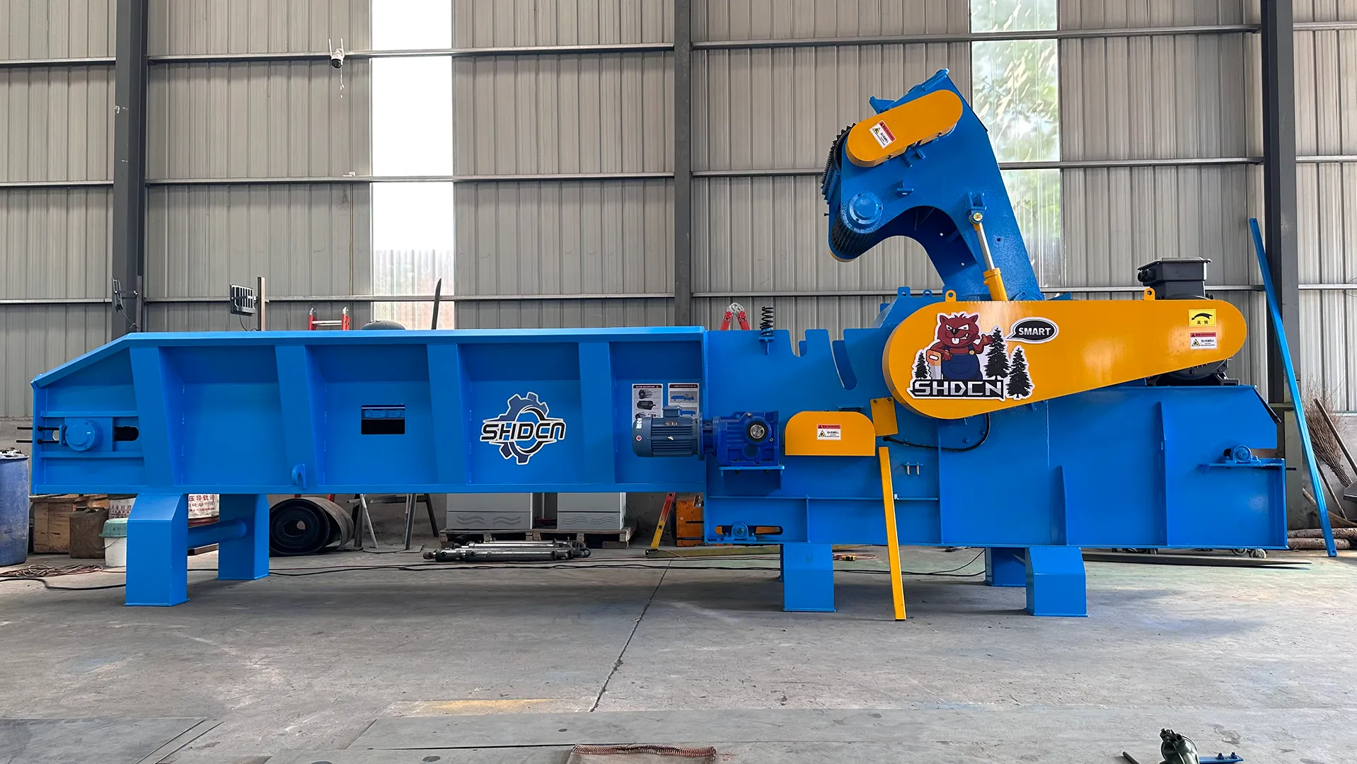 What factors should factories consider when choosing a wood chipper?