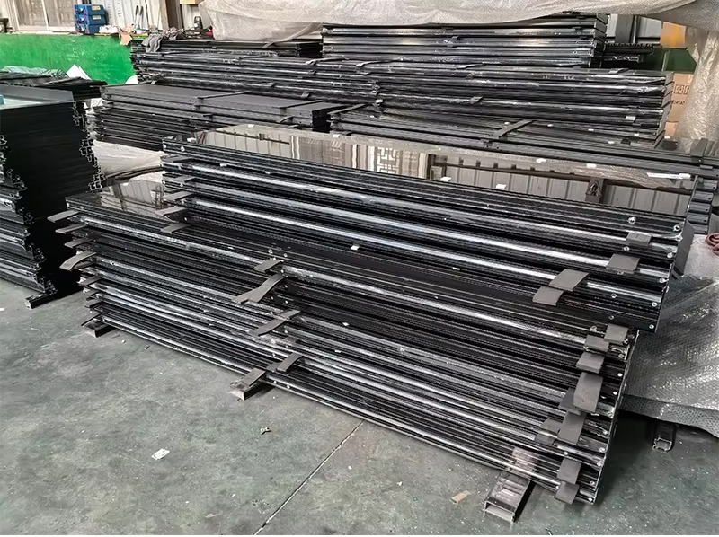 Insulated steel garage door manufacturing facility and production line