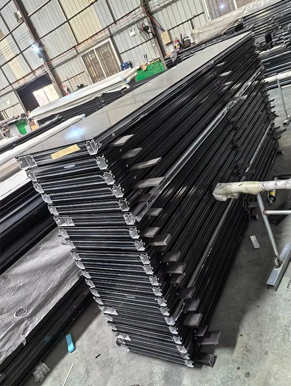 Insulated steel garage door panel cutting and shaping machinery