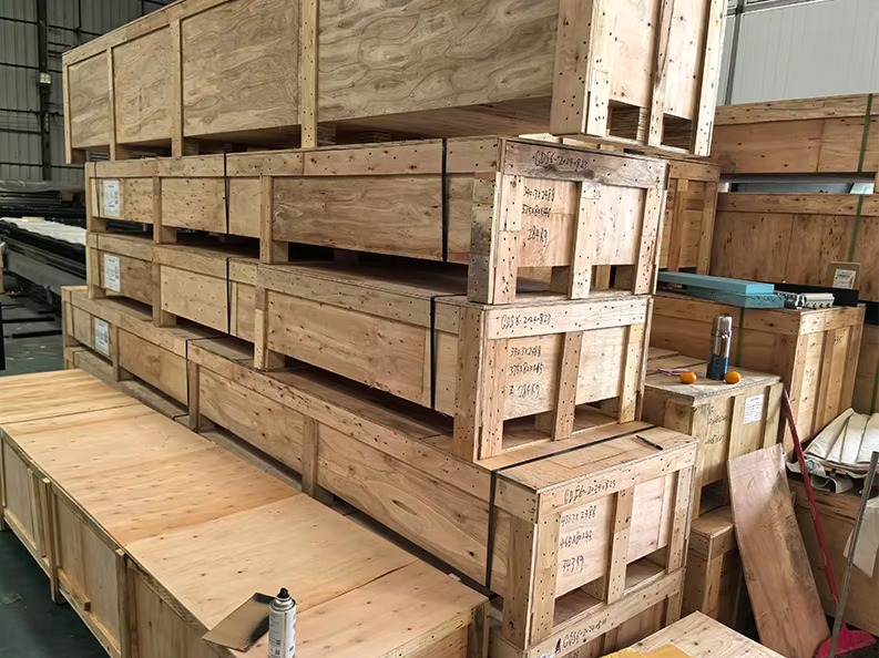 Modern garage door protective packaging with wooden frame reinforcement