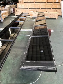 Modern garage door surface finishing and coating process details