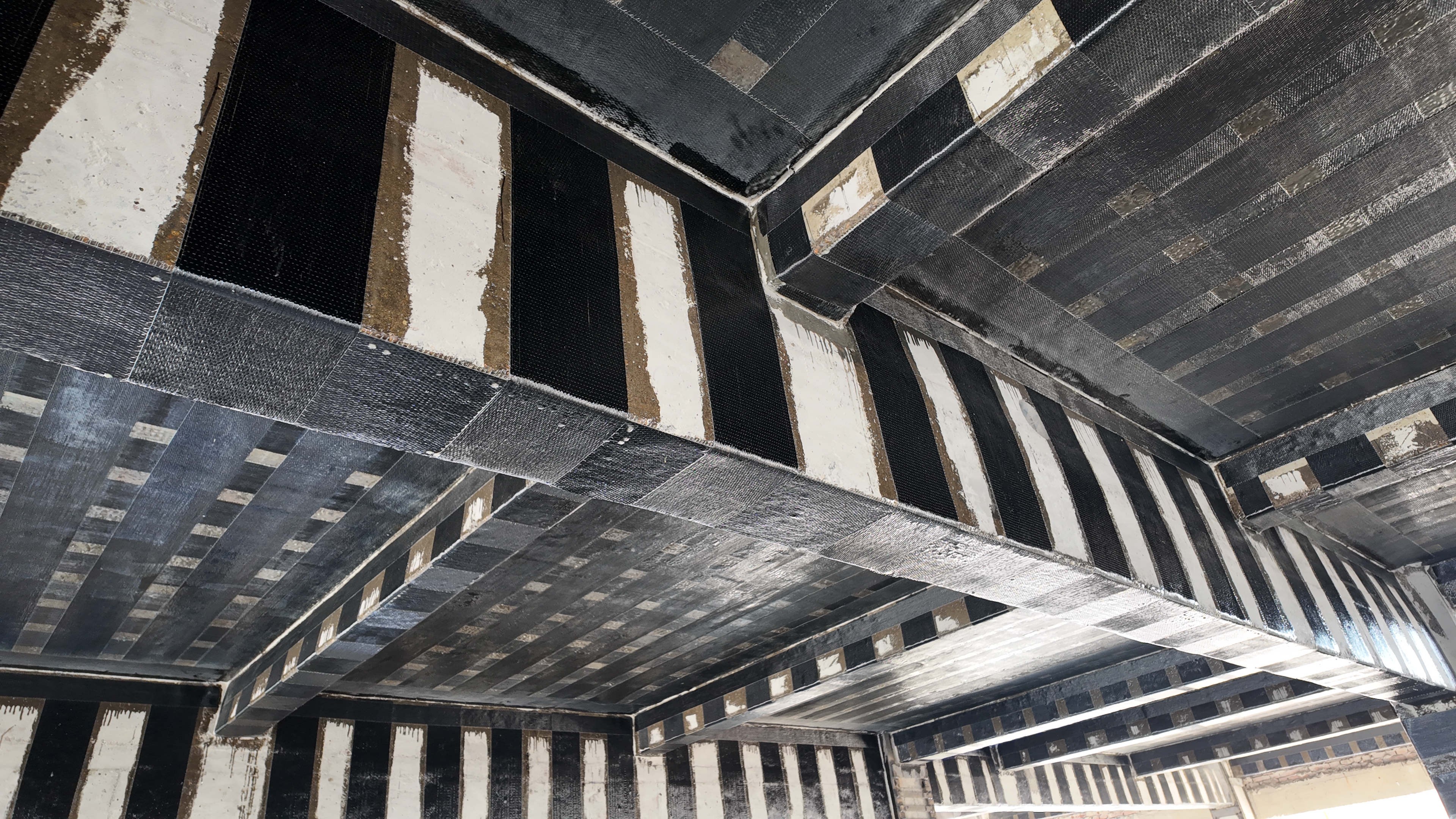 Can Carbon Fiber cloth, Thin as Cicada Wings, Truly Reinforce Buildings and Bridges? Unveiling the 