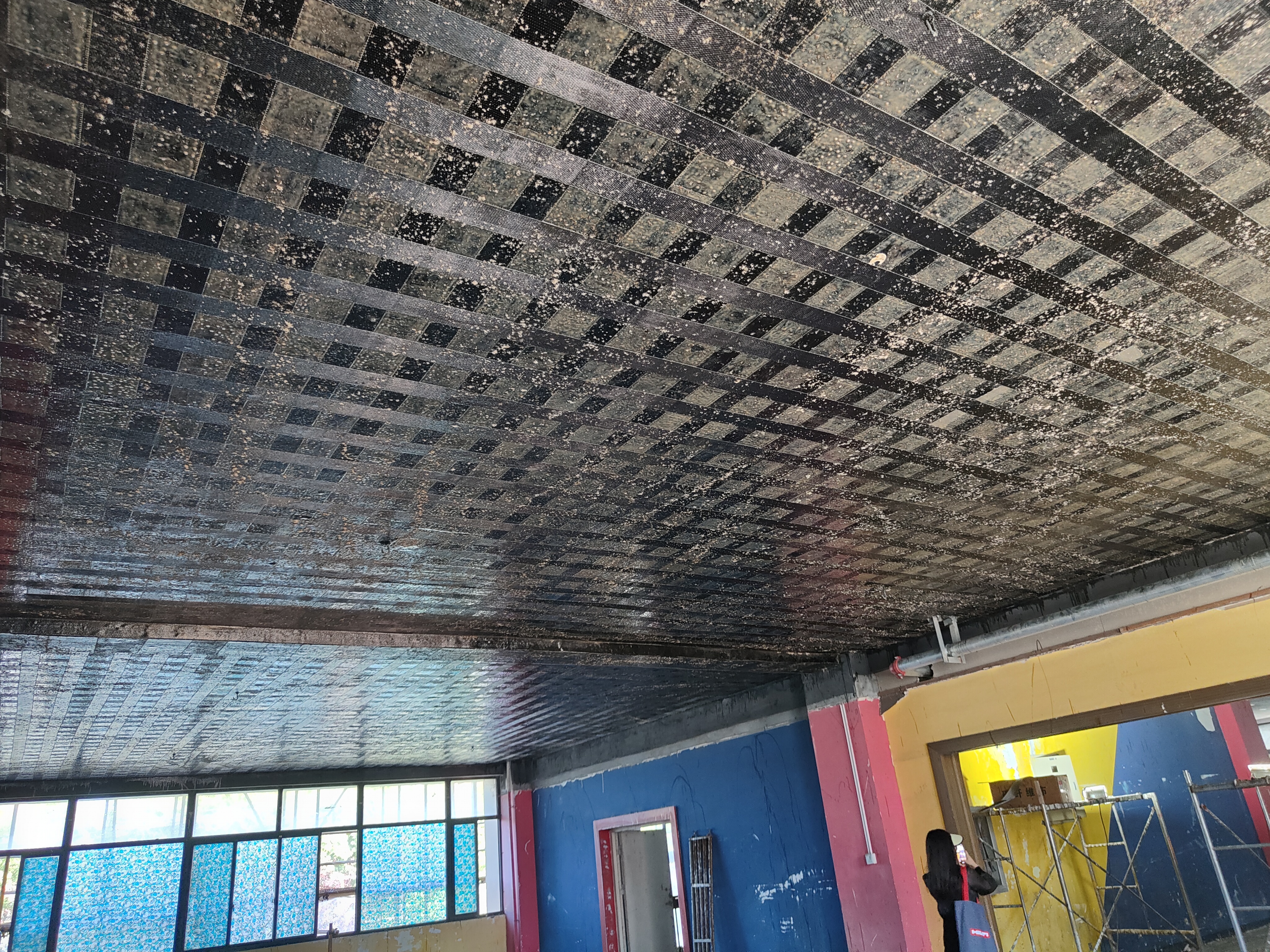 Carbon Fiber Reinforced Polymer (CFRP) Fabric Strengthening