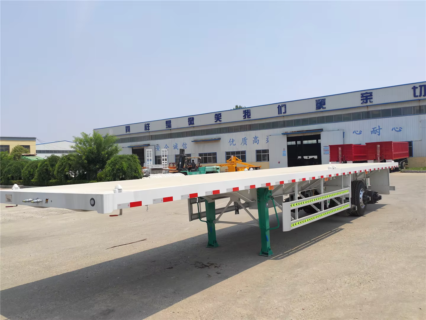 3 Axle 20ft 40ft 53ft Container Transport 60 Ton Flat Bed Trailers Flatbed Semi Trailers for Sale factory