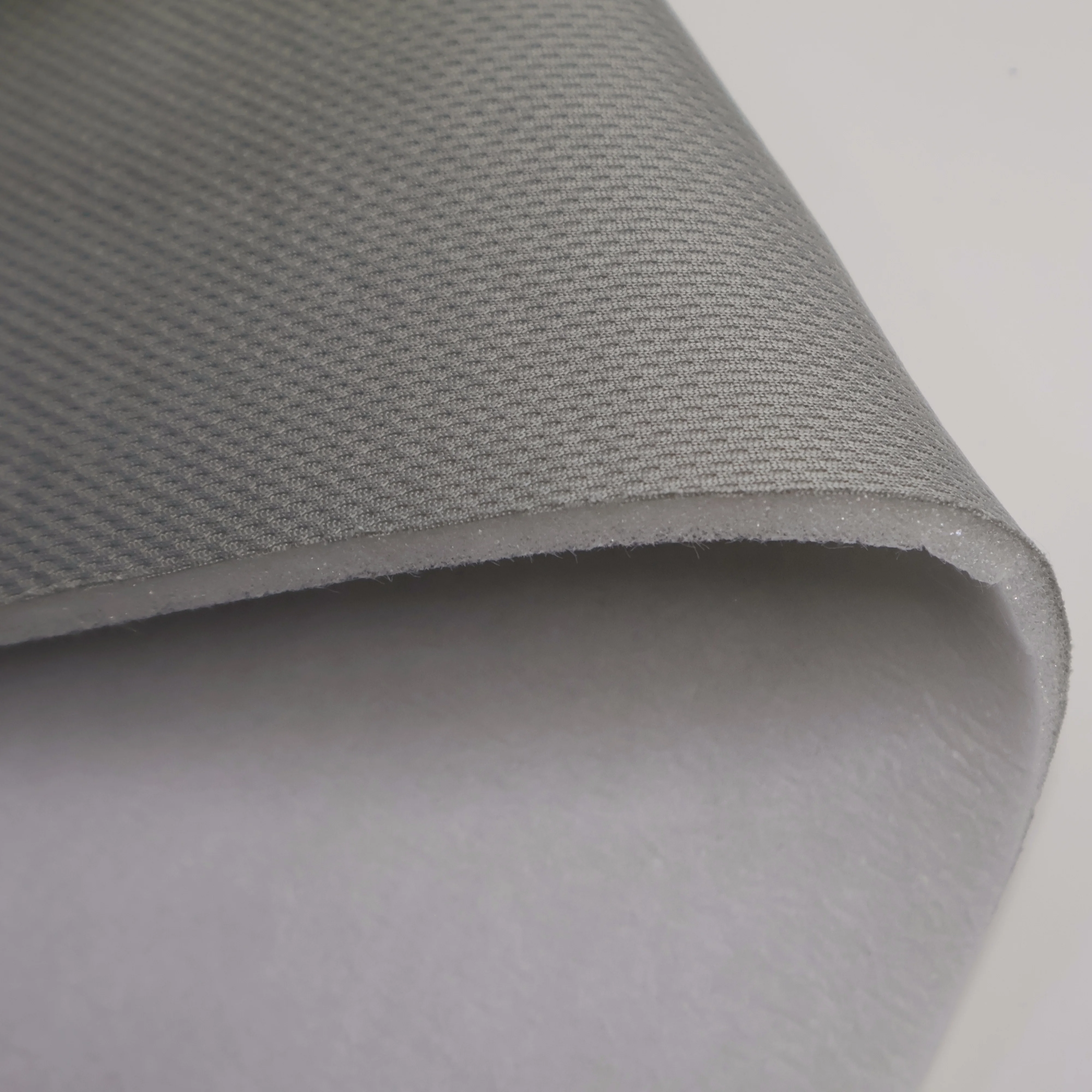Bird Eye Fabric Laminated PU Foam with Nonwoven Backing for Helmet Liners Bag Padding Seat Cushions and Protective Applications