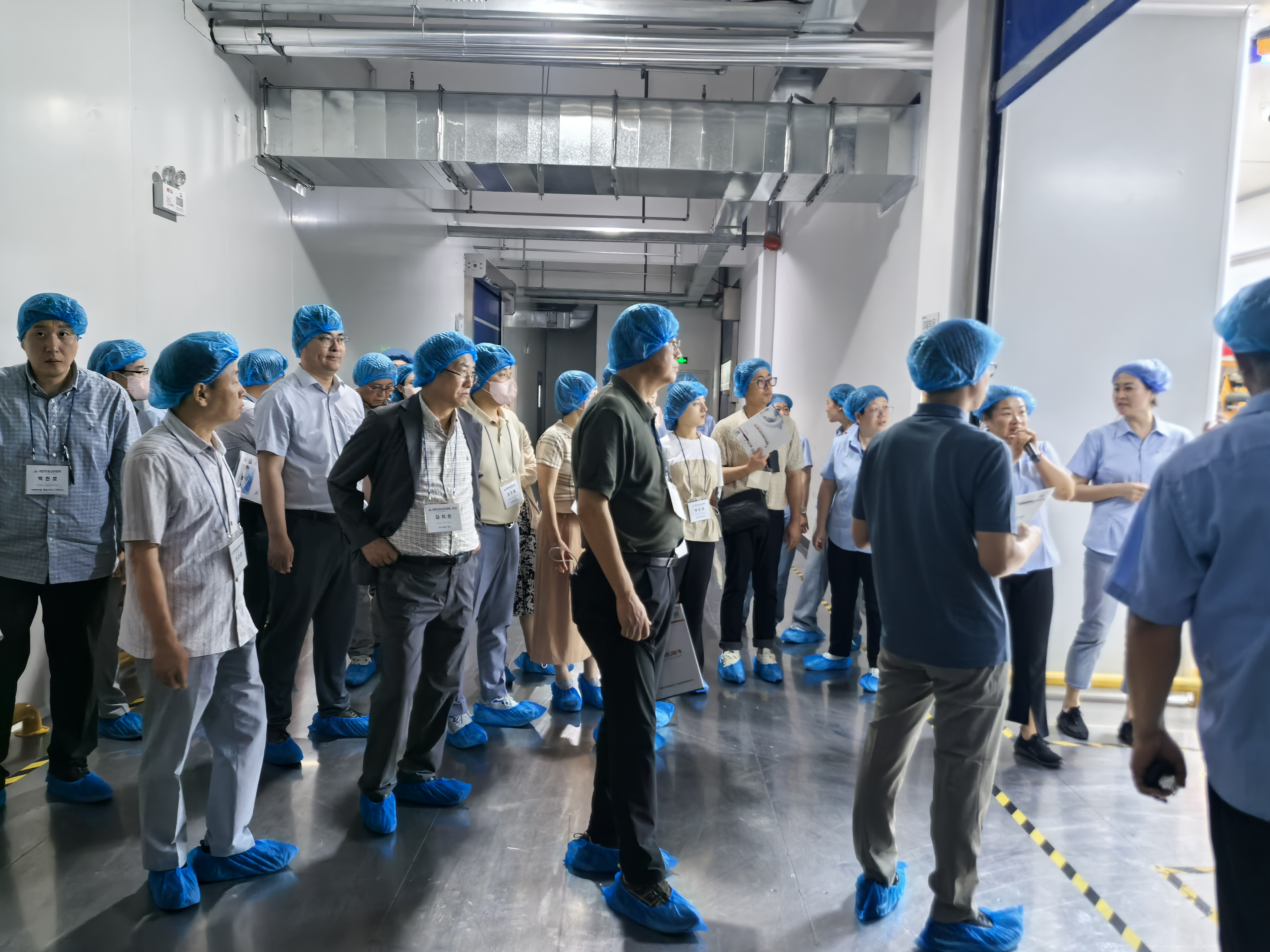 Haodong Packing verwelkomt een delegatie van de Zuid-Koreaanse vereniging voor kant-en-klaarmaaltijden voor een uitgebreide fabrieksbezoek