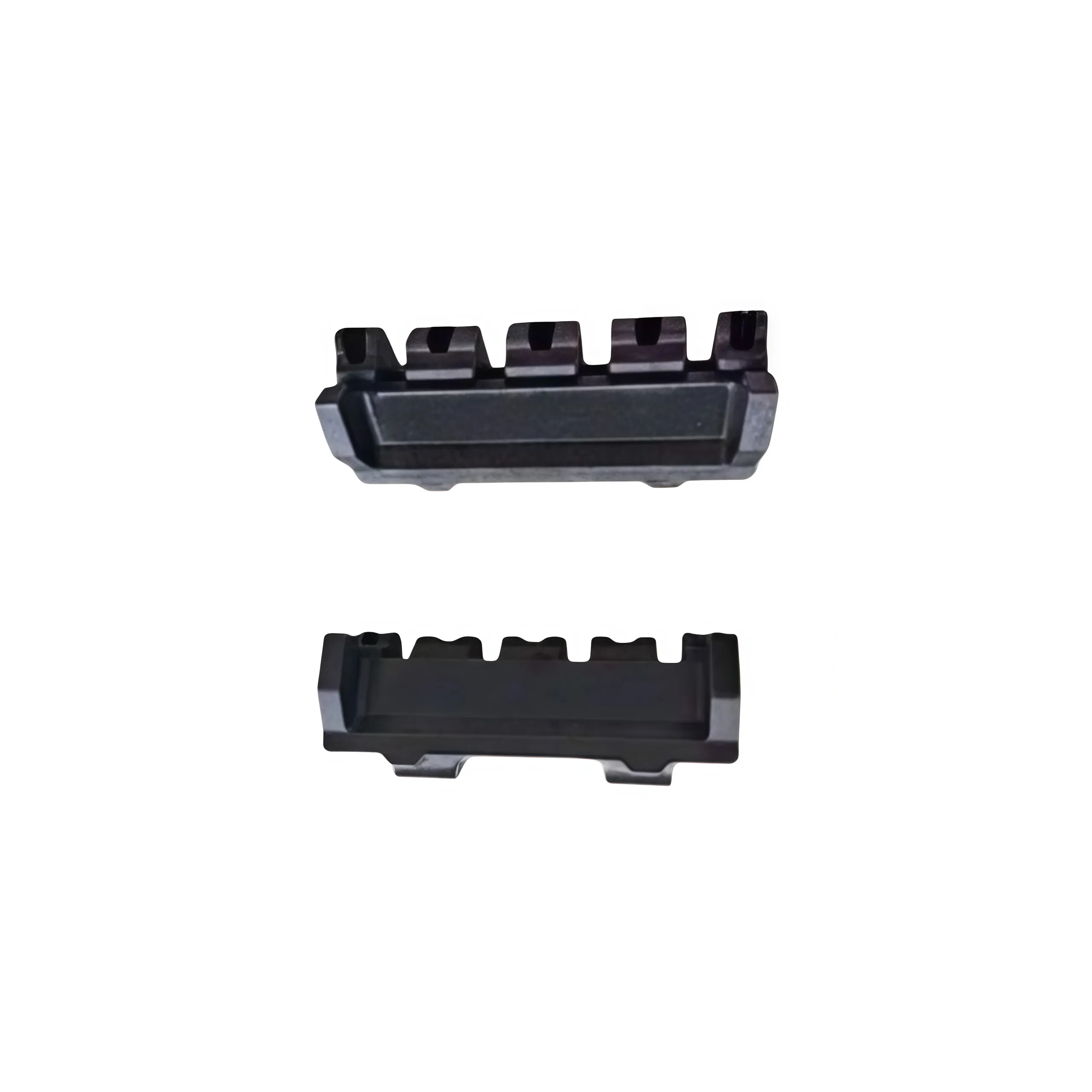What is the function of a tie plate in railway track systems?