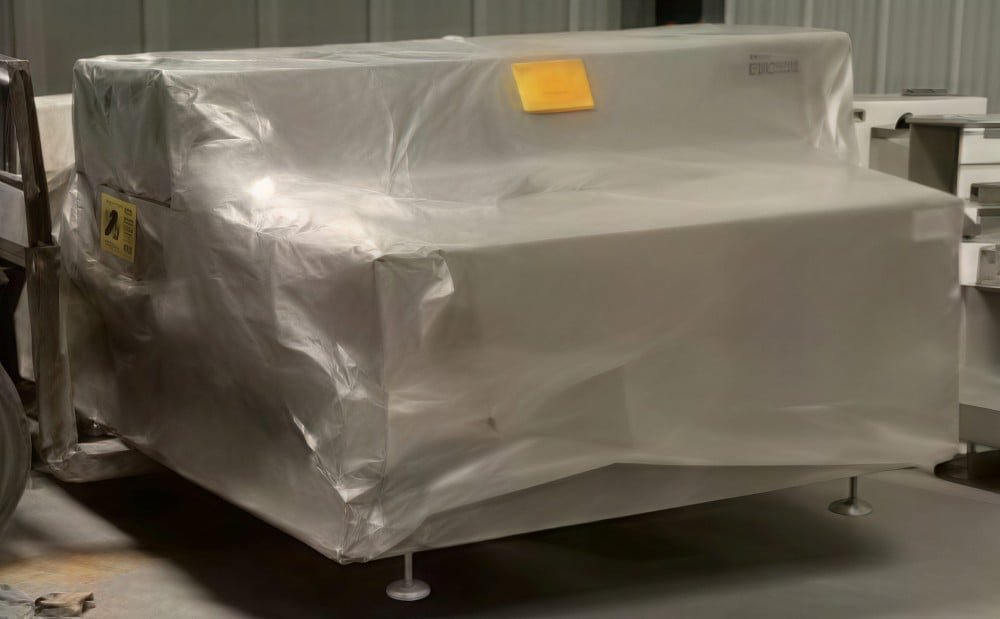1-Wrapping withprotective film.jpg