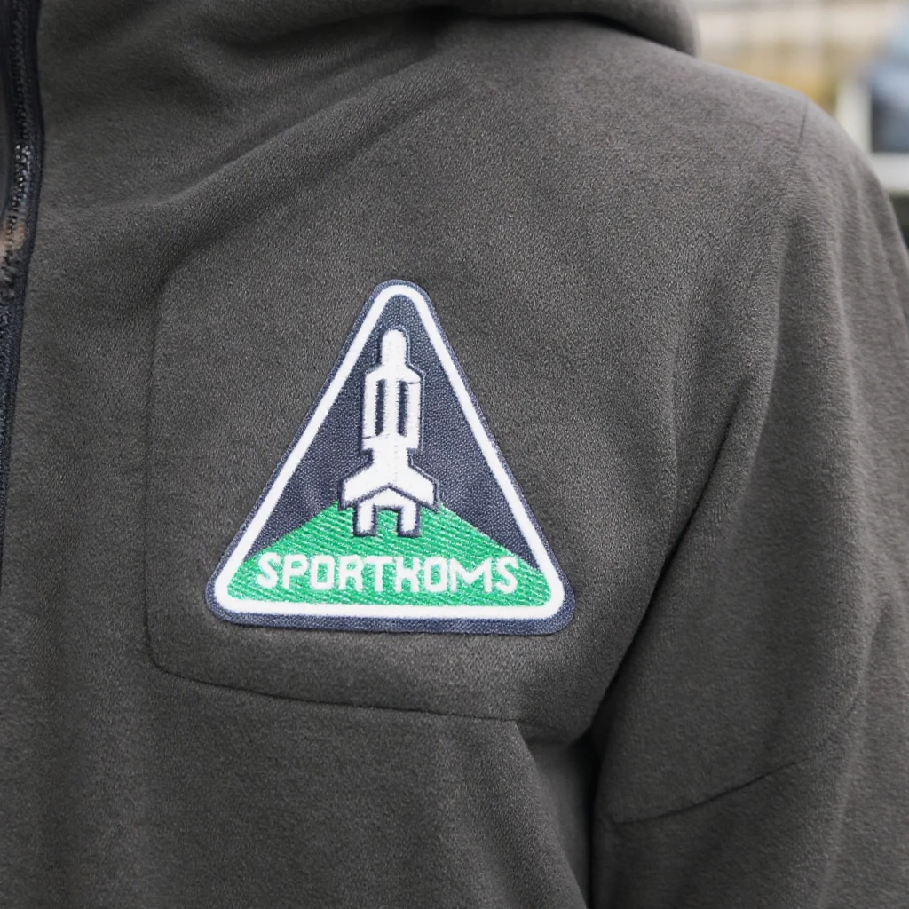 How do embroidery patches achieve industrial-grade durability for sportswear?