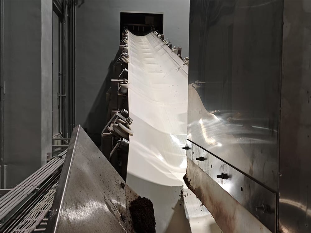 The Installation Team Is Installing And Commissioning A Large Pu Conveyor For A Customer