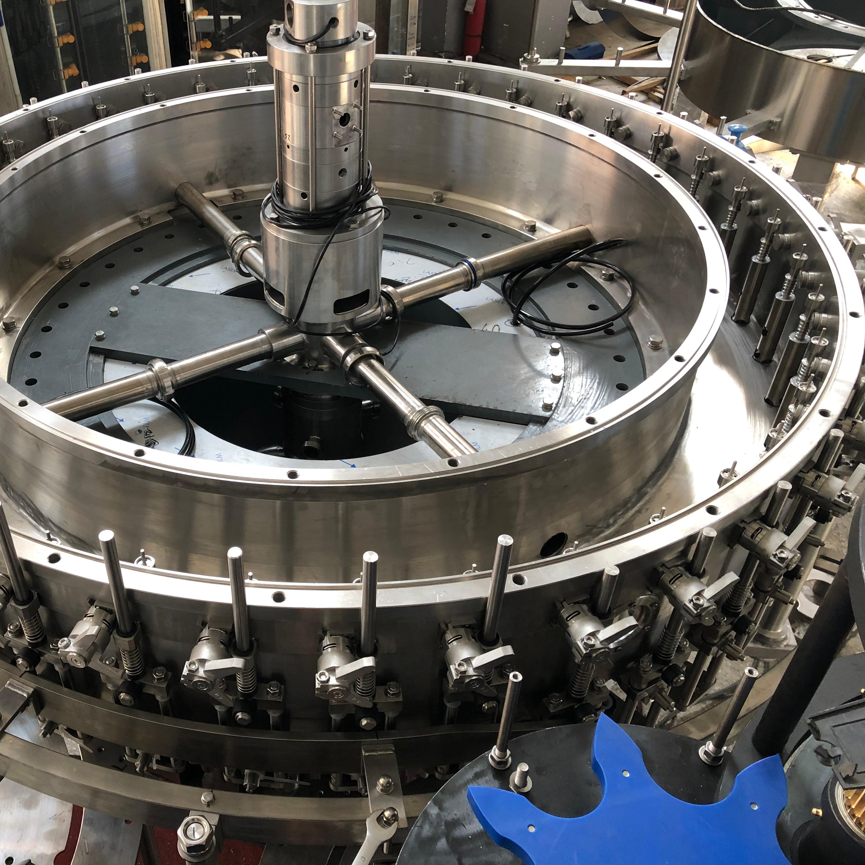 What Are the Benefits of Investing in a Carbonated Filling Machine?