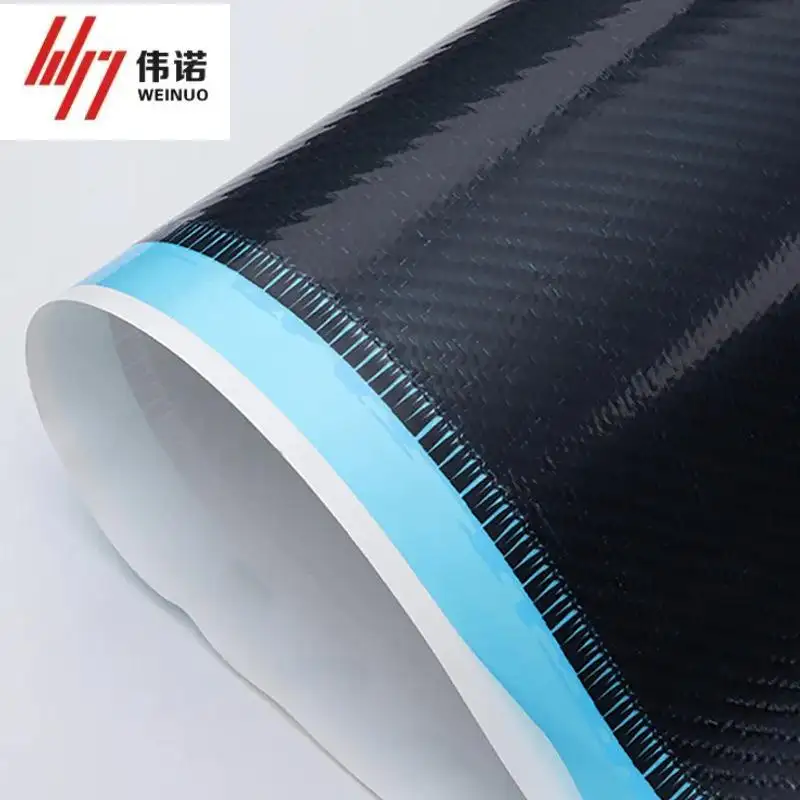 Why do composite factories prefer twill weave carbon fiber?