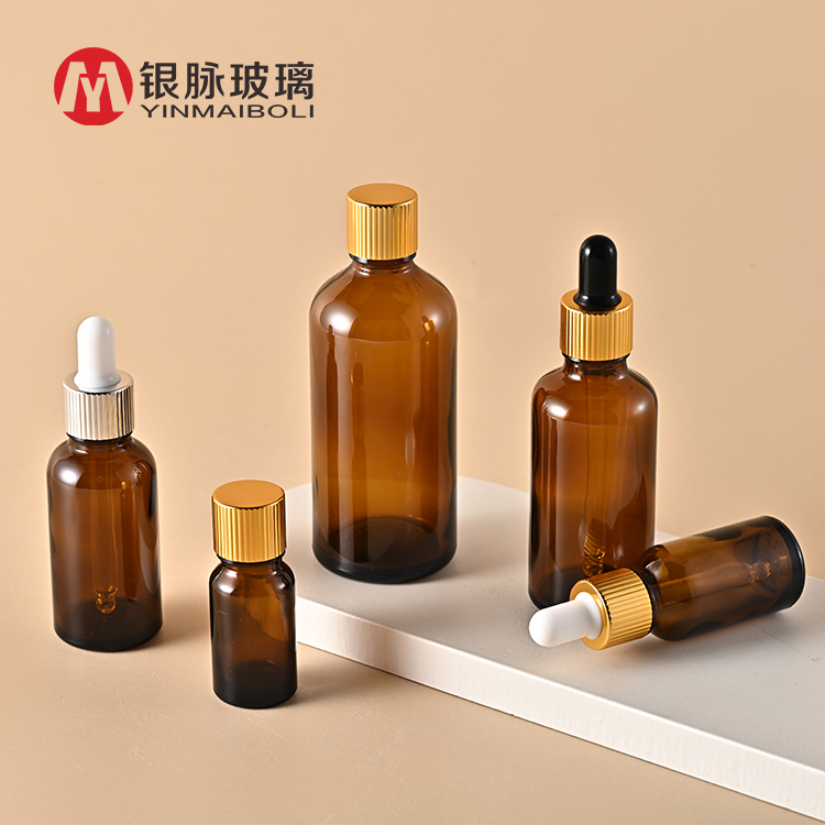 Mewah 0.5 oz 1 oz 2 oz 10ml 15ml 20ml 30ml 50ml 100ml Amber minyak pati serum muka kaca botol dropper emas dengan topi emas