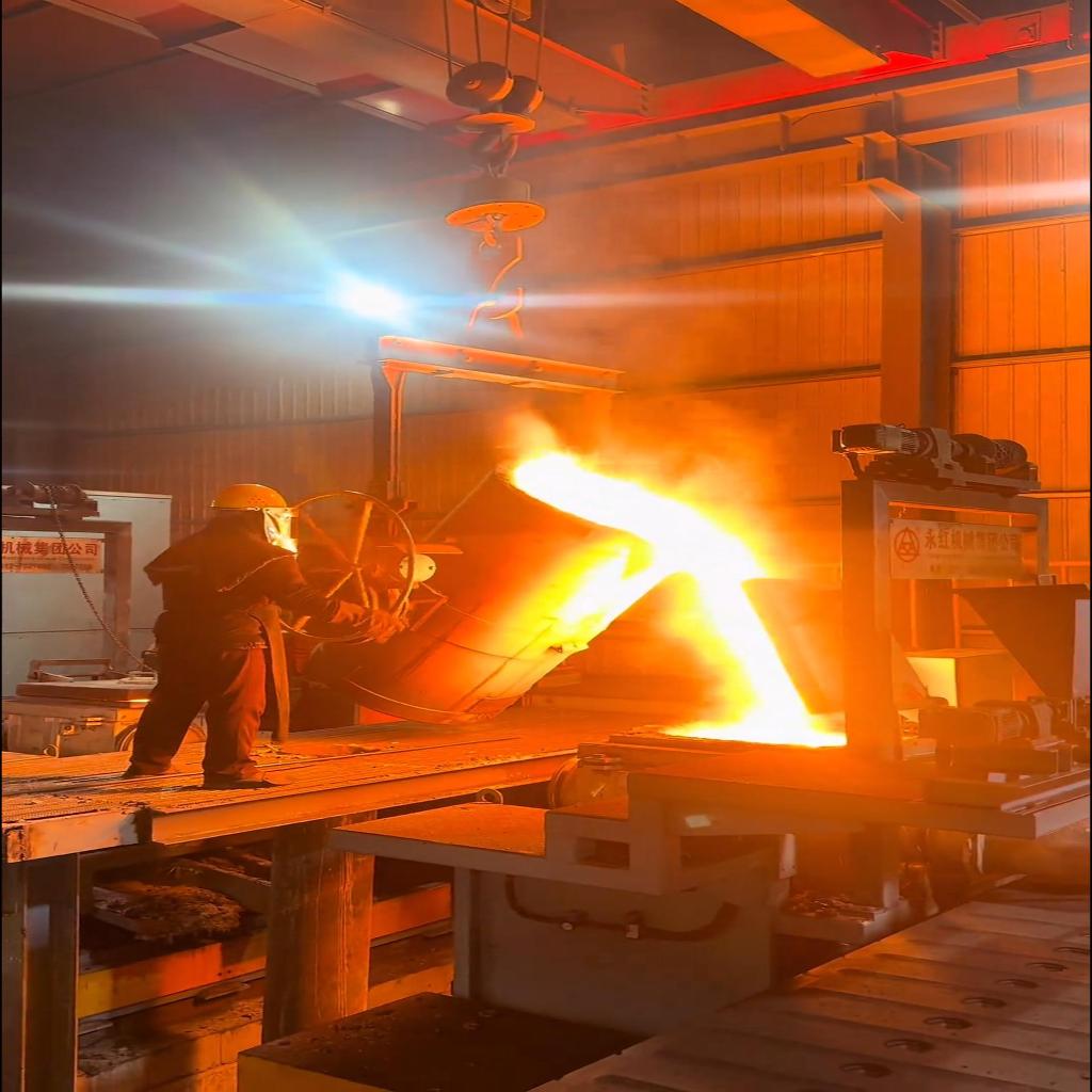 The pouring process of sand casting