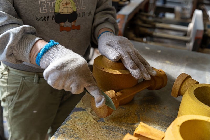 Resin-coated sand casting process