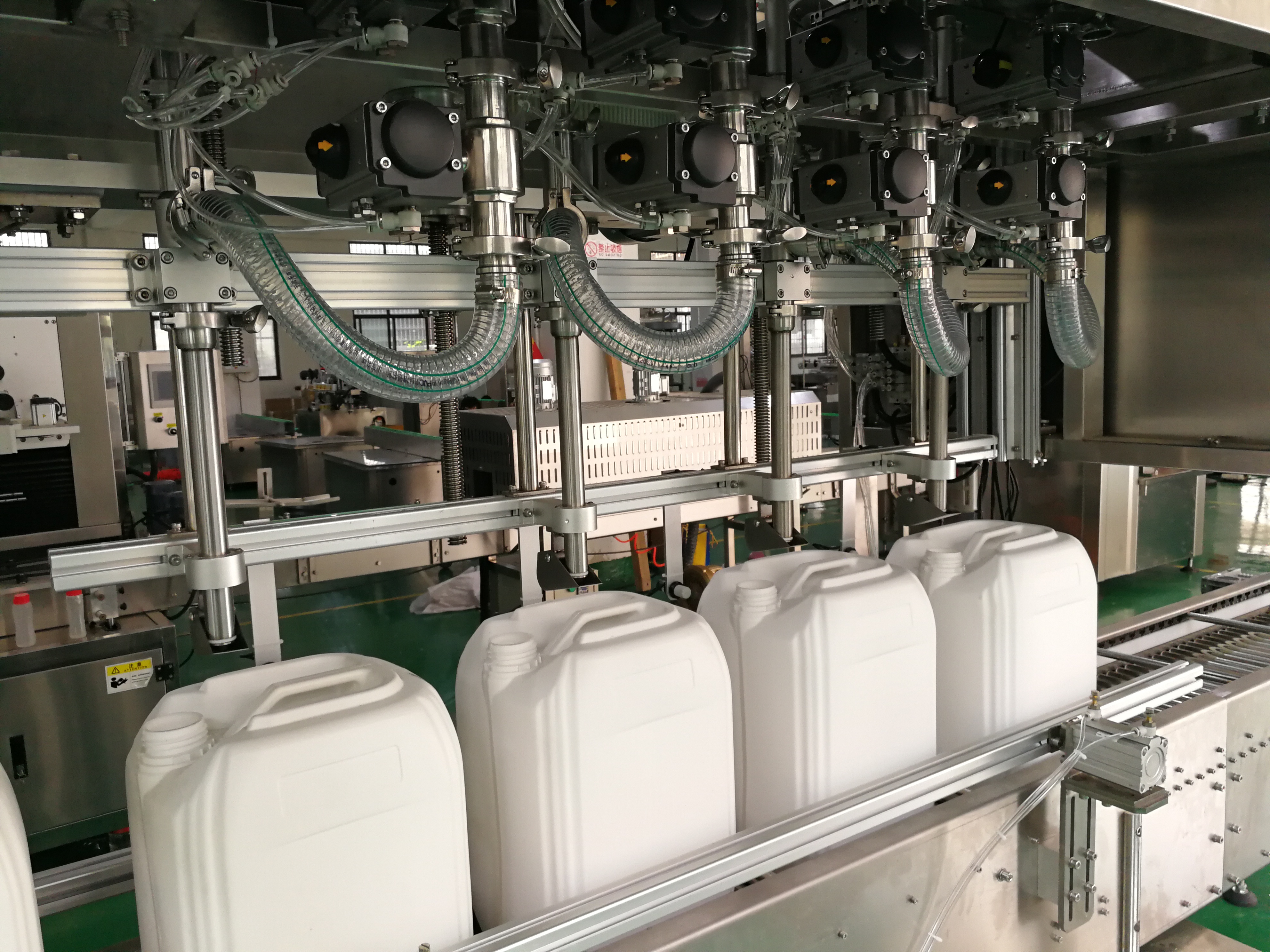 Multi-Head Liquid Weighing Filling Machine factory
