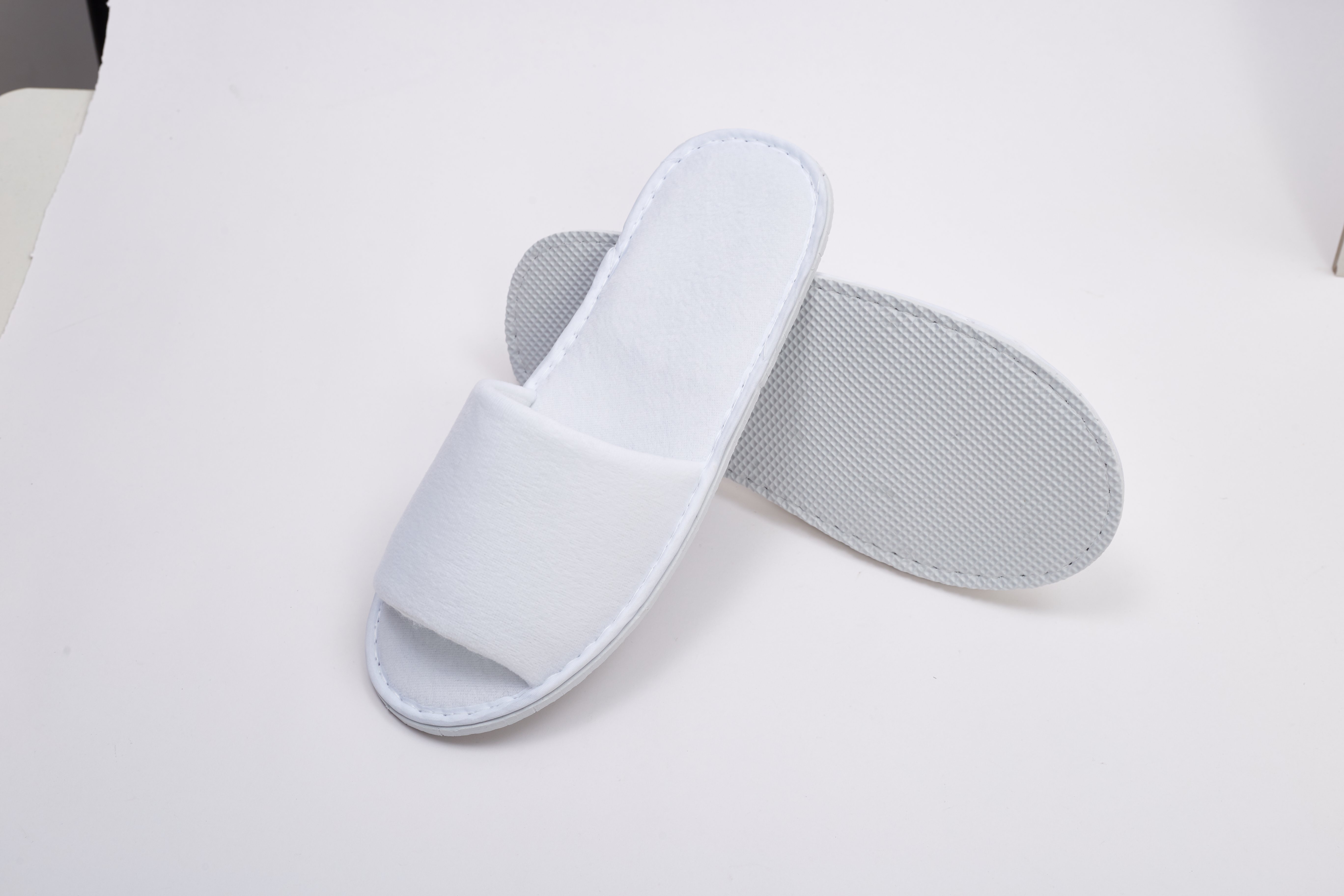 Hoe beïnvloeden hotelslippers de algehele gastervaring?