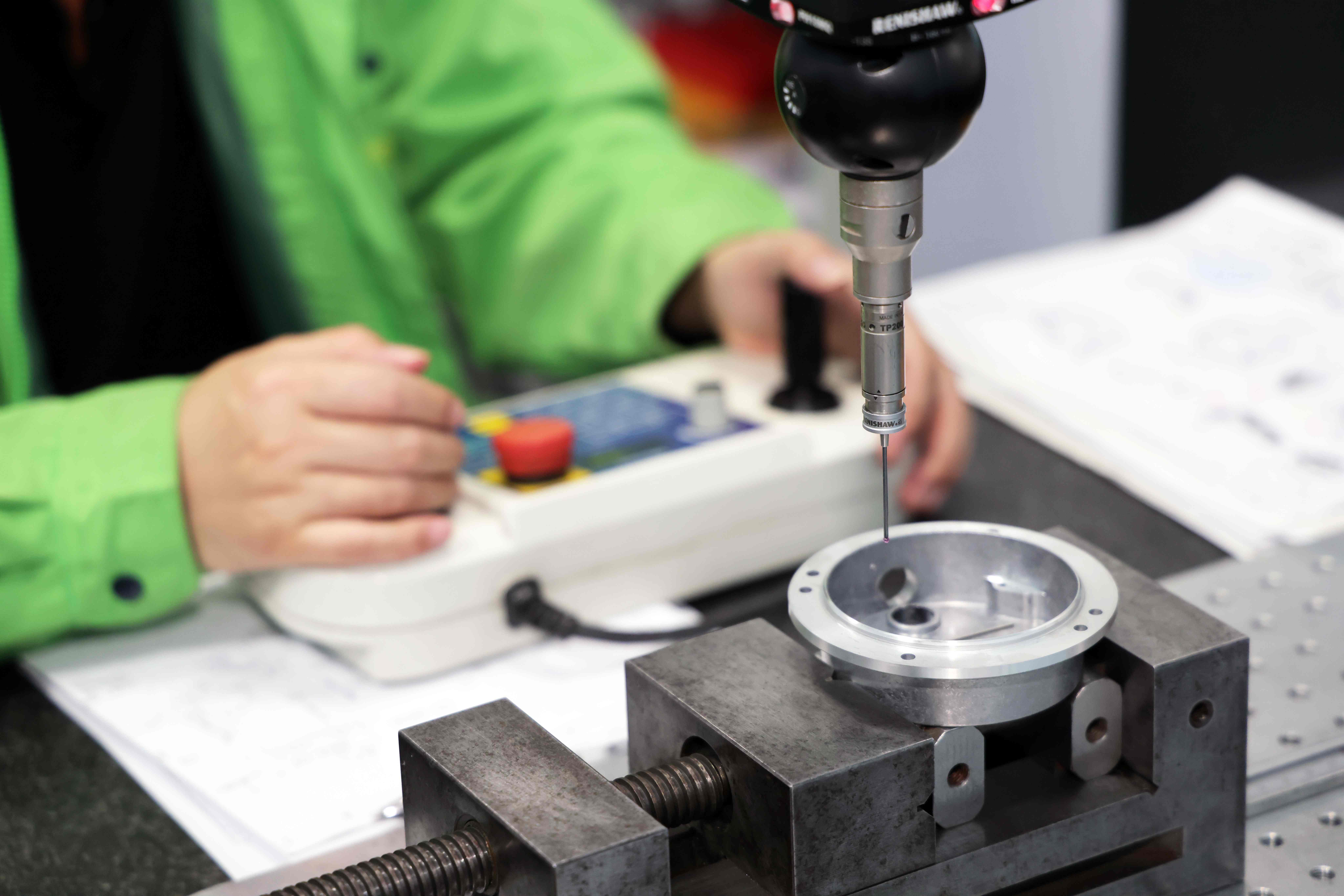 Aluminum die cast part undergoing X-ray and CMM inspection for ISO and IATF quality assurance compliance