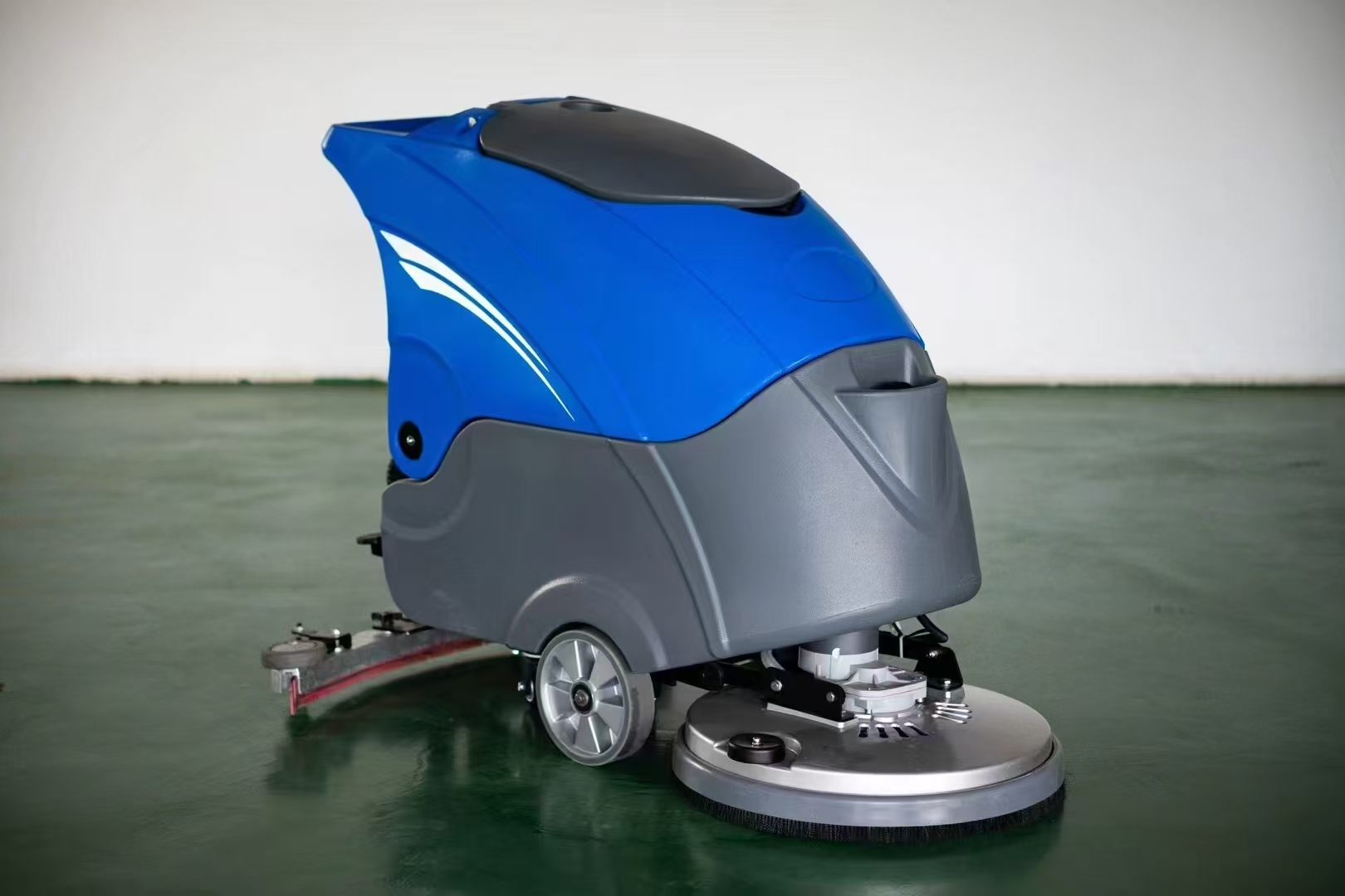Why Every Hotel Needs a Walk Behind Floor Scrubber
