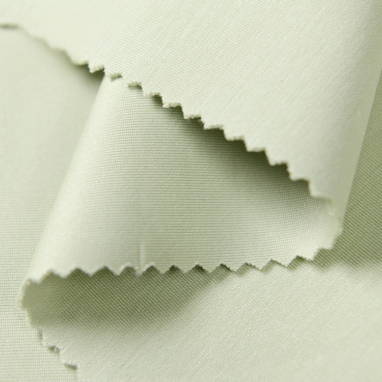 What are the latest trends in sustainable knitted fabric manufacturing?