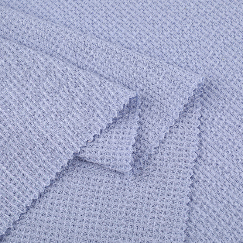 Why is waffle knit the perfect choice for absorbent bathrobes?