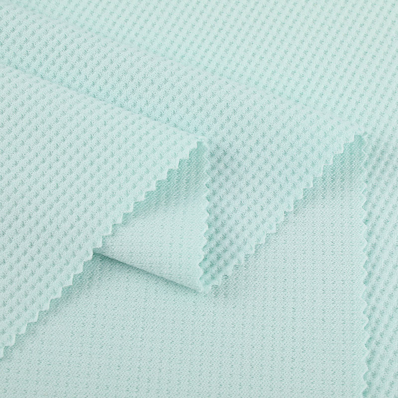What are the technical specs to look for in industrial mesh fabric?