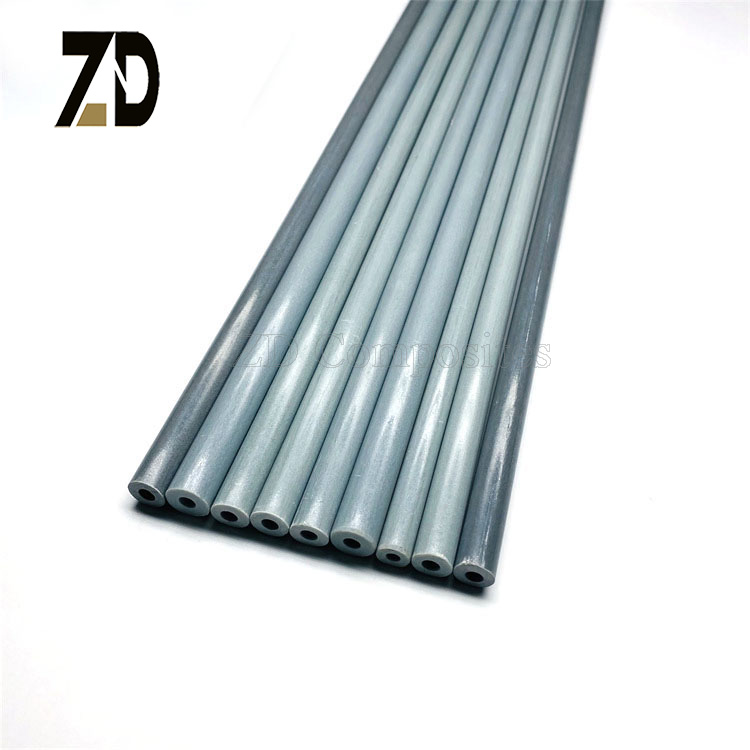 How resistant are fiberglass tubes to corrosive chemicals like sulfuric acid or saltwater?