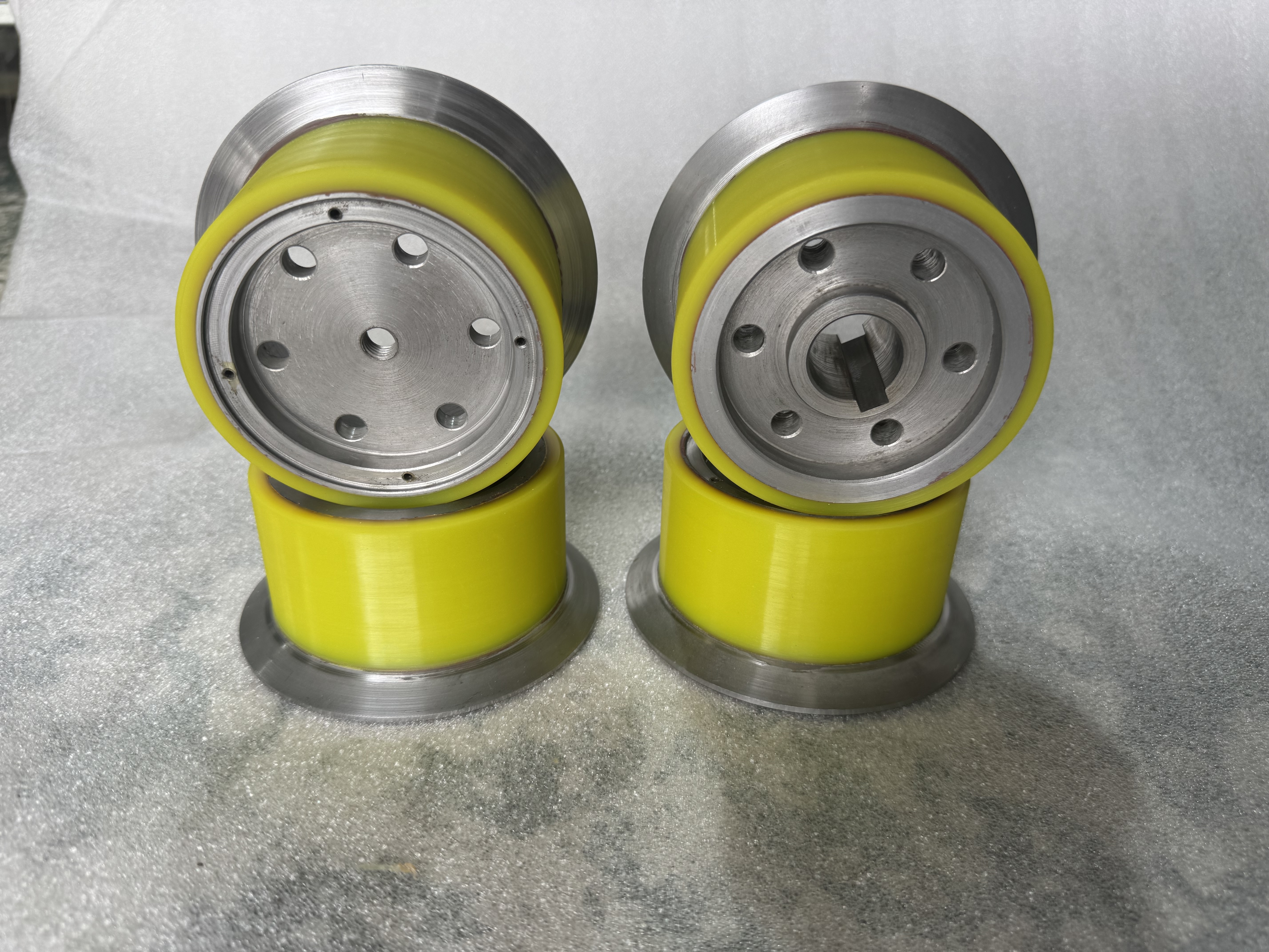 The versatility of round belts in complex, multi-directional pulley systems.