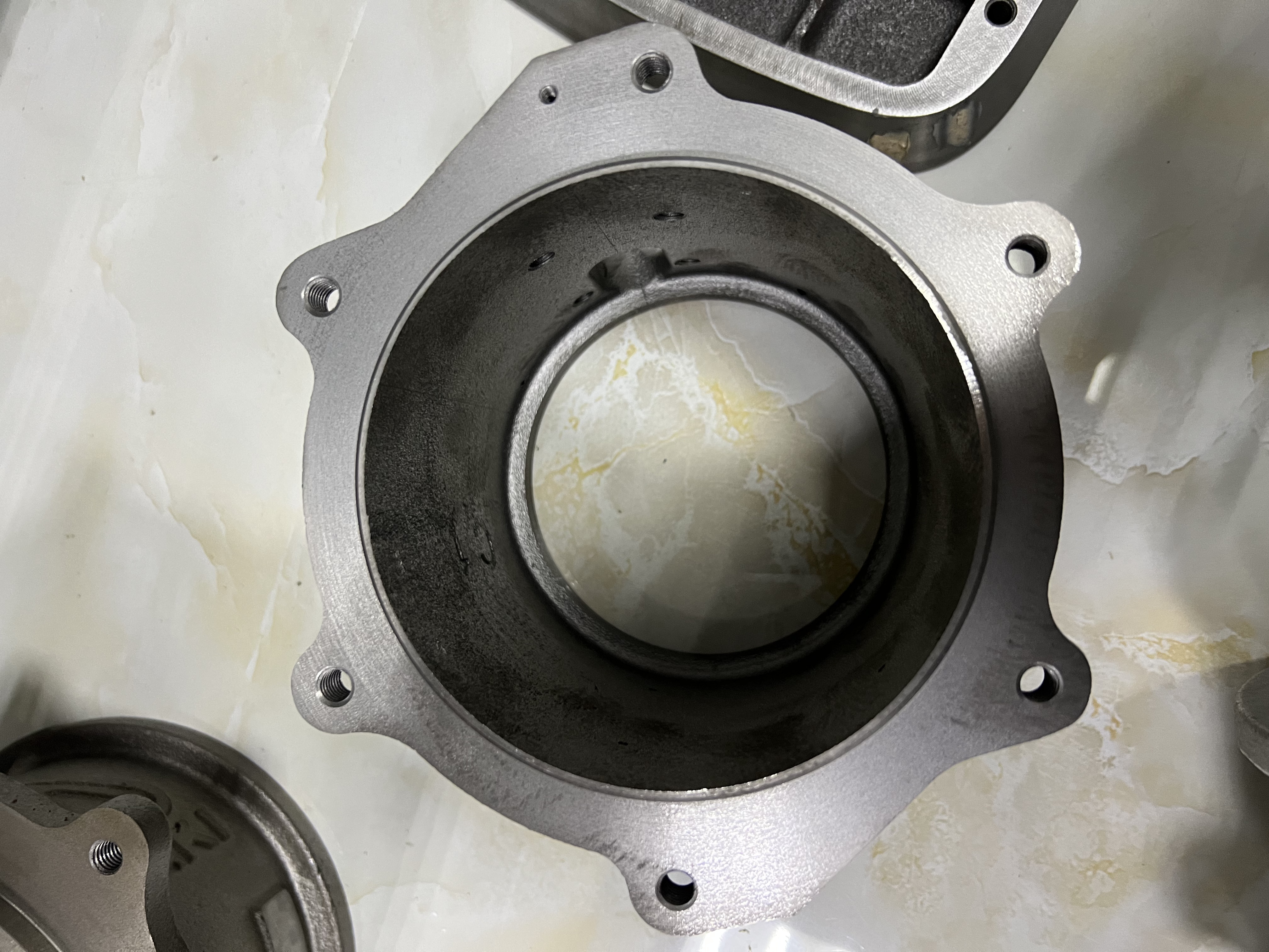 Our Company: Partnering with IWAKI Since 2022, Manufacturing Pump Components