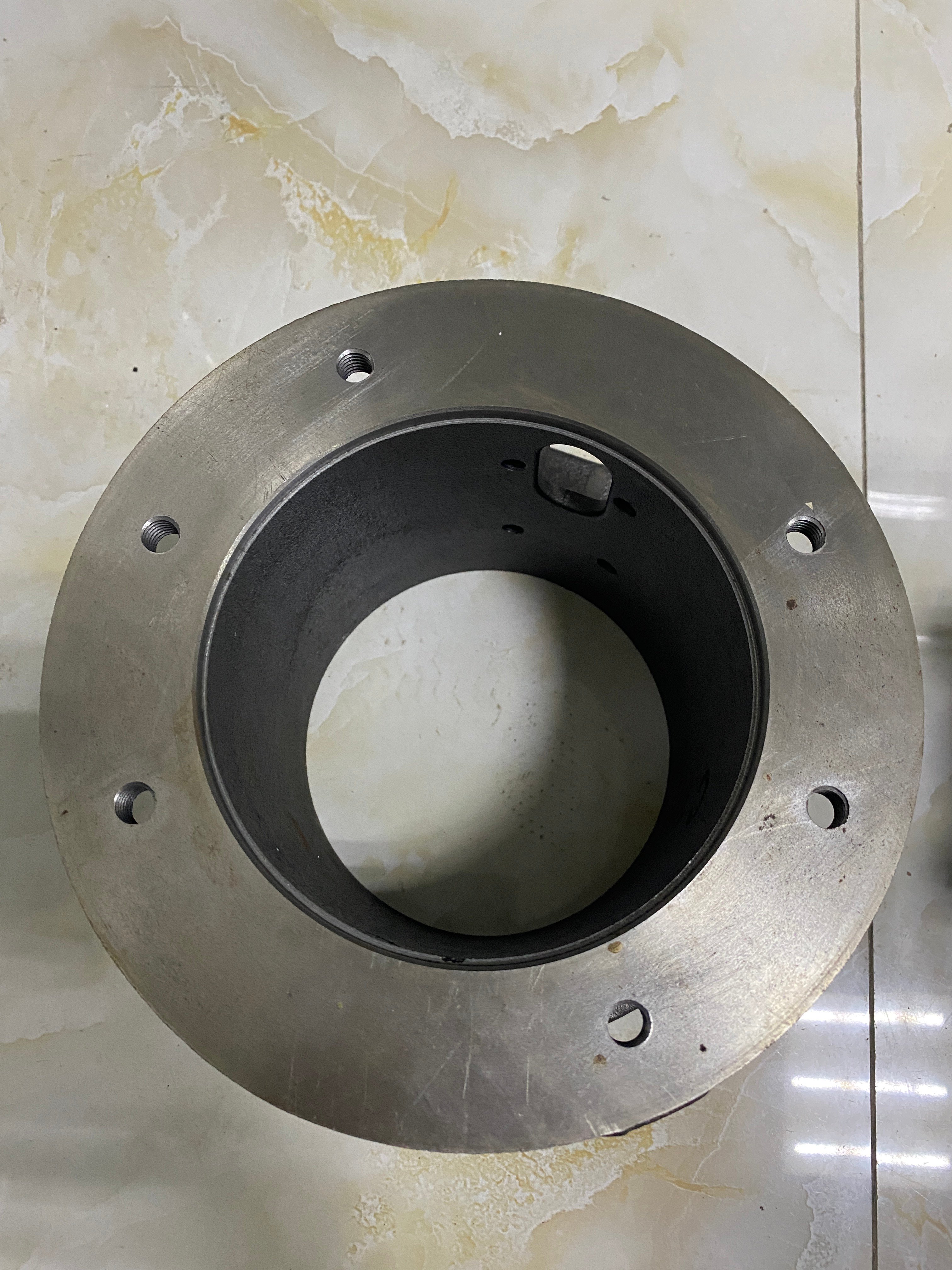 Our Company: Partnering with IWAKI Since 2022, Manufacturing Pump Components