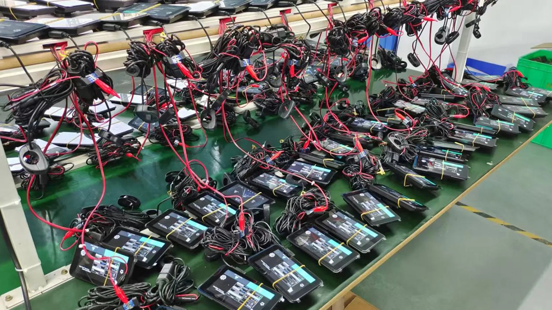 Motorcycle display products on production bench.webp