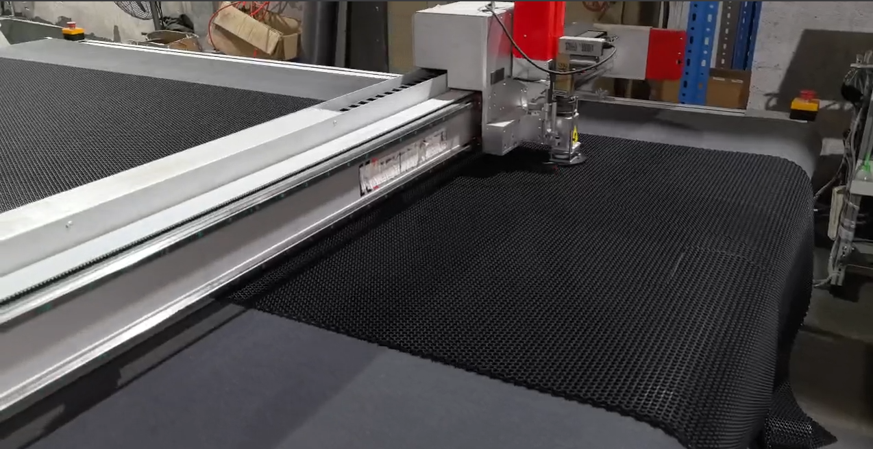 Cutting car floor mat shapes from PVC roll material