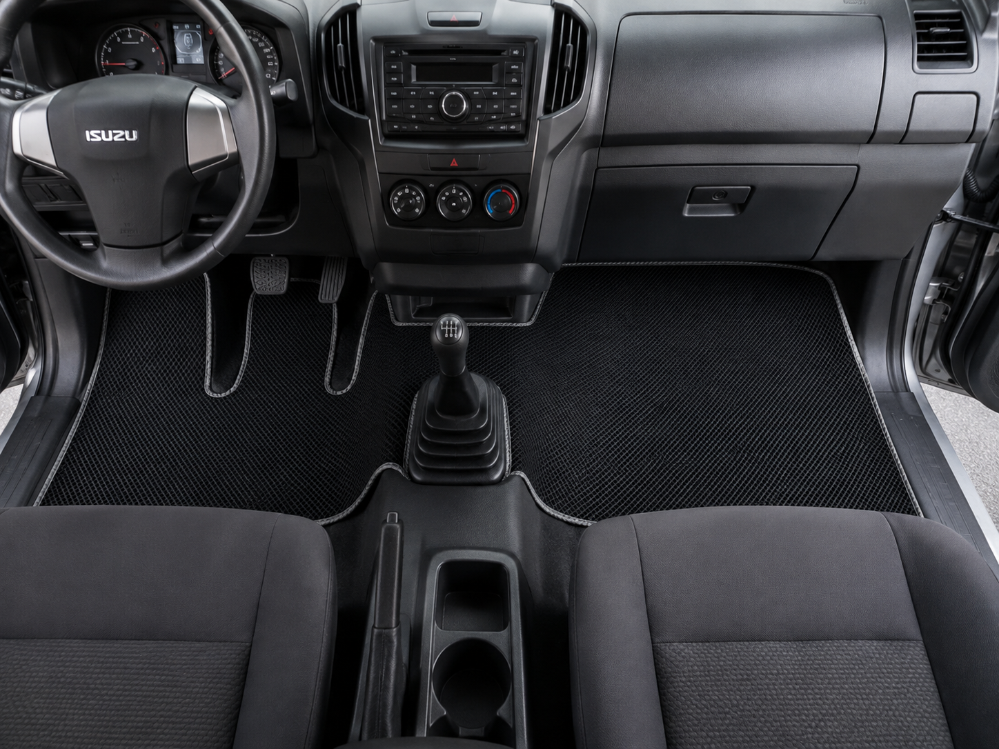 custom fit truck floor mat installed in cabin.png