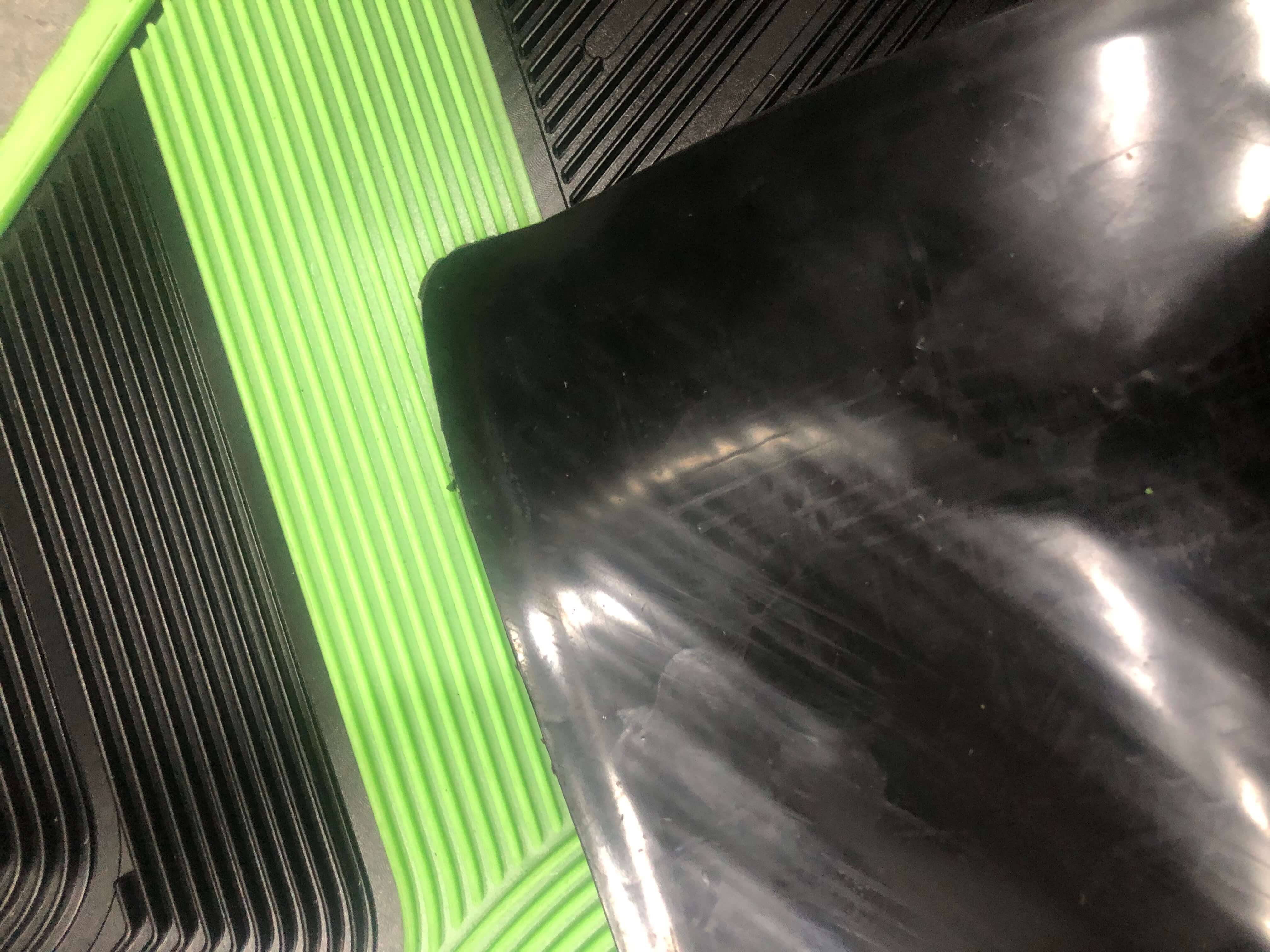 Anti-slip backing design of Tesla Model Y rubber floor mats.jpg
