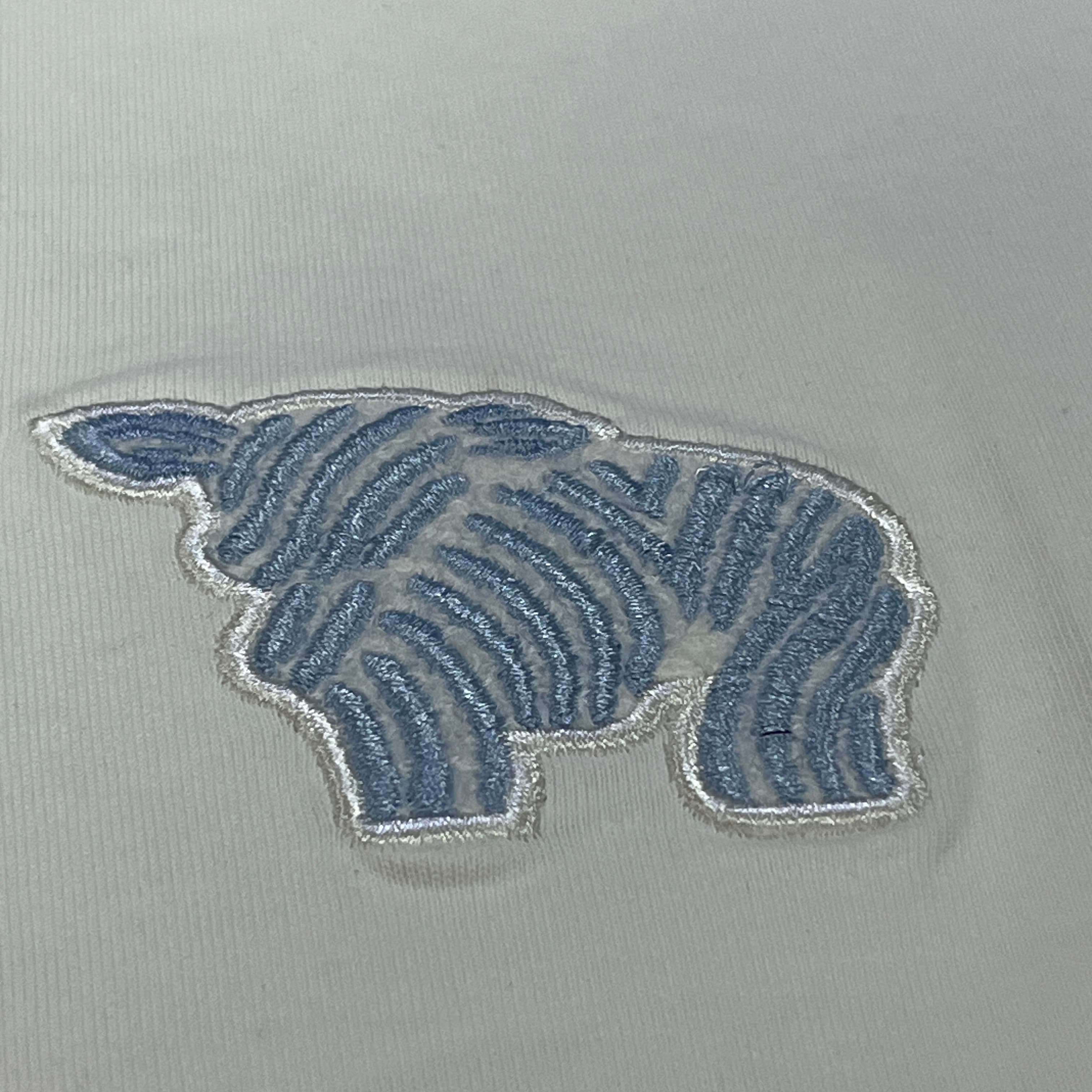 How much does stone wash processing add to the unit cost of a blank t-shirt?