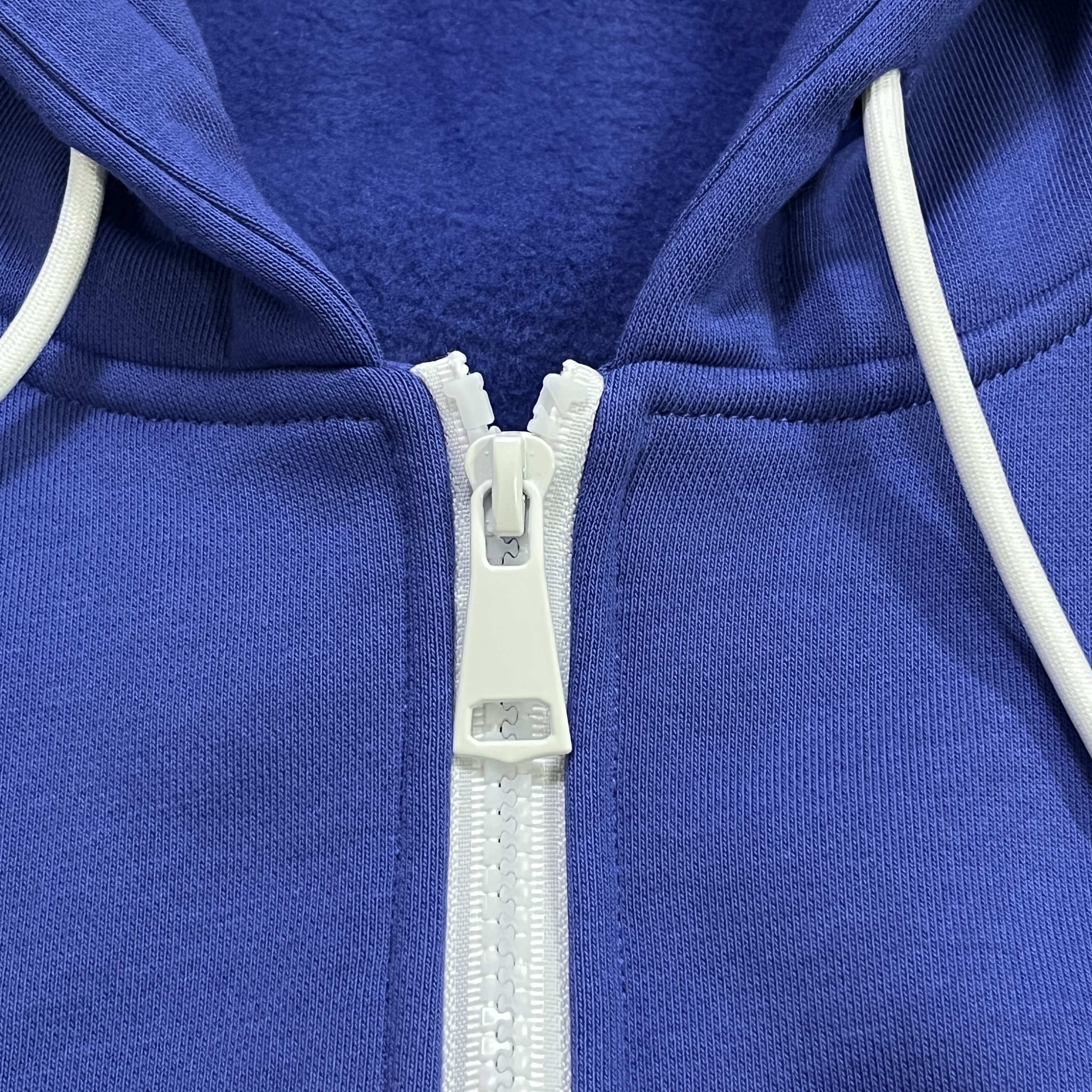 How does wholesale pricing for boxy fit t shirt compare to slim fit?