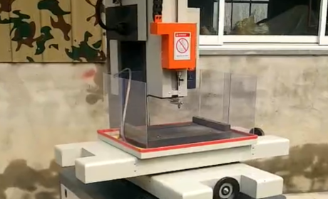 Small hole processing machine