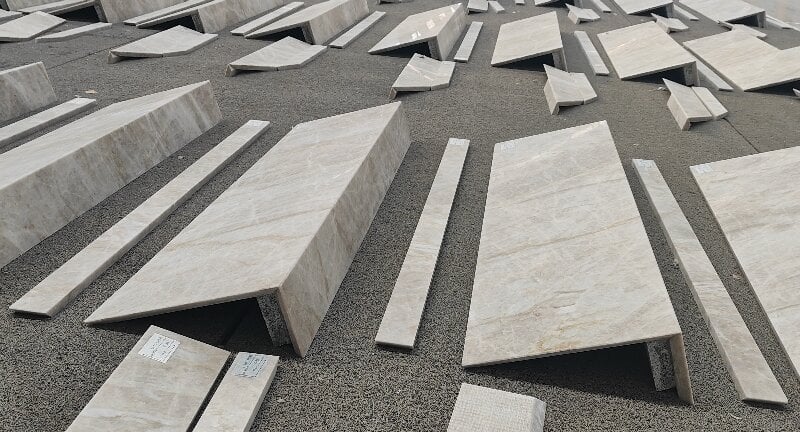 Precision-crafted mitered edge on a Taj Mahal Quartzite countertop by YDSTONE.jpg