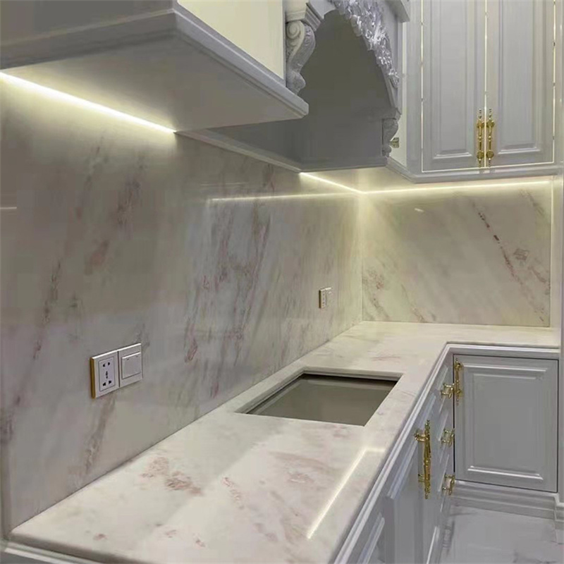 White Calacatta Marble (Dining Table Counter) installed in spa bathroom vanity — real project reference from Yuanda Stone