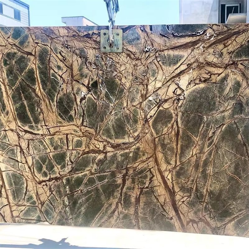 Green Rainforest Brown Marble installed in kitchen backsplash feature wall — real project reference from Yuanda Stone