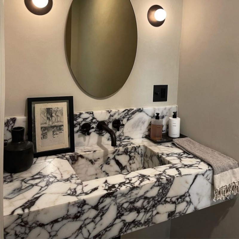 Calacatta Viola Marble installed in spa bathroom vanity — completed project reference