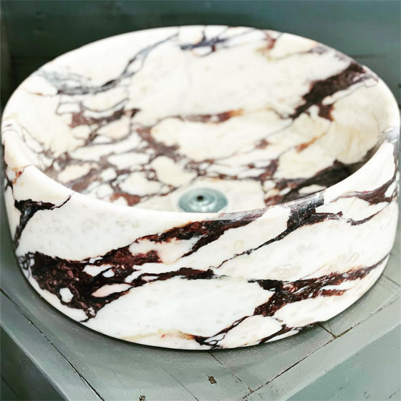 Italian Calacatta Viola Marble applied as kitchen island countertop