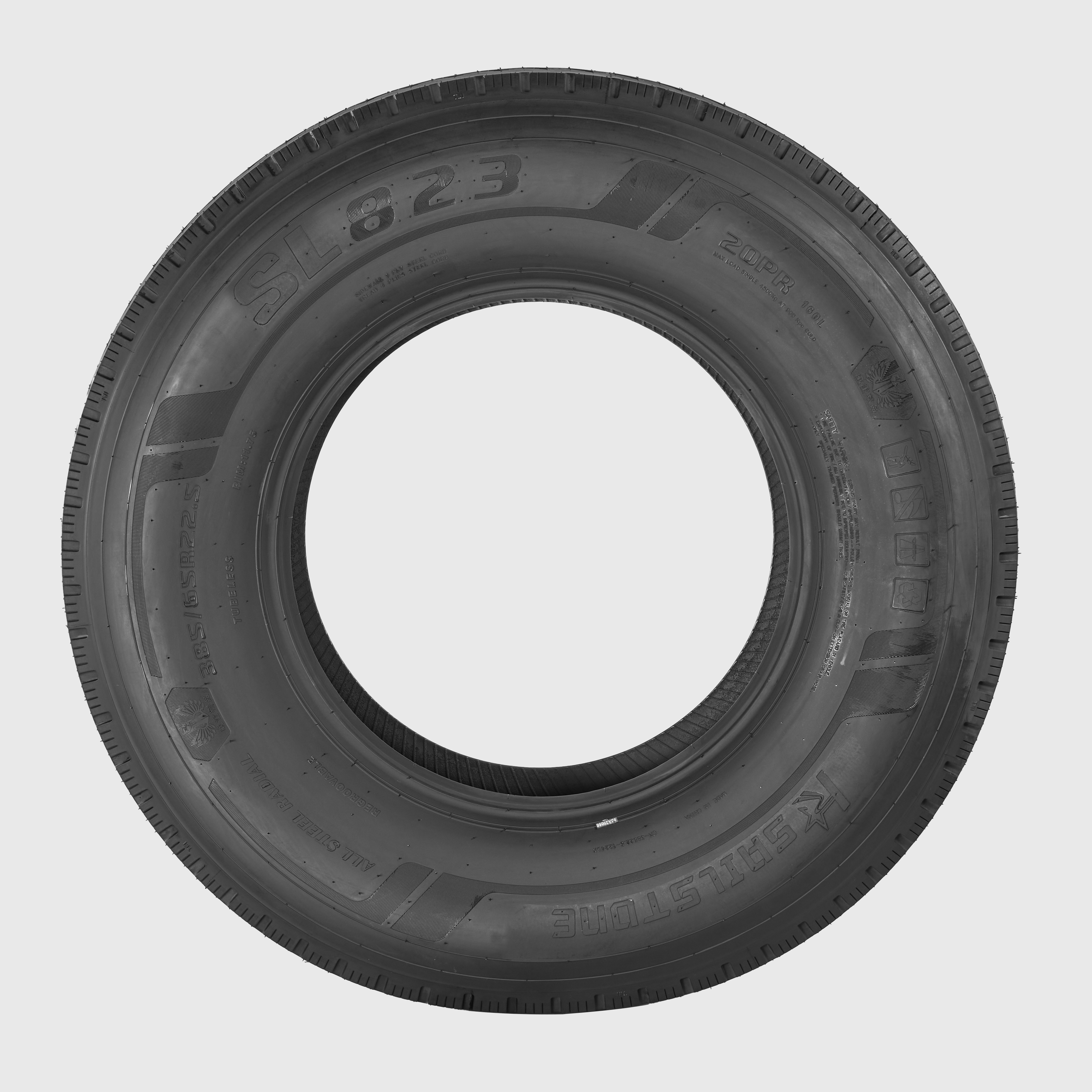 Premium truck tire manufacturing with deep tread technology.
