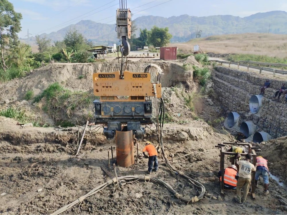 Bridge Foundation Construction in Mountain Area, Papua New Guinea – AT-180 Driving 12m × Ø830mm Steel Tube Piles